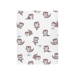 SDMKA otter crib sheet with elastic fit ensuring snug mattress coverage.