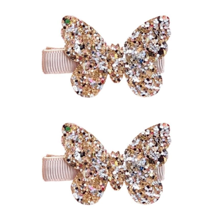 Seadiquiet gold butterfly bow clip adds sparkle to daily hairstyles.