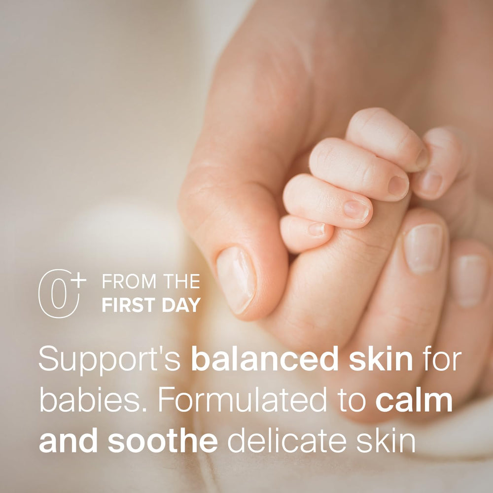 SEBAMED Baby Lotion on baby arm demonstrates gentle massage for daily care.