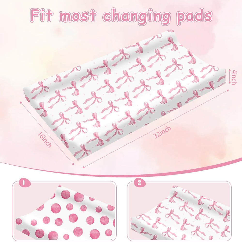 Sel Natural 2-pack changing pad covers with bows for a warm nursery look.