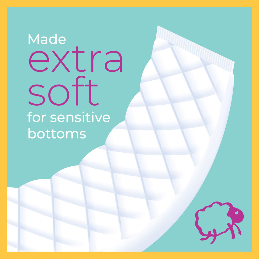Select Kids Sposie booster pads placed inside a diaper for overnight use