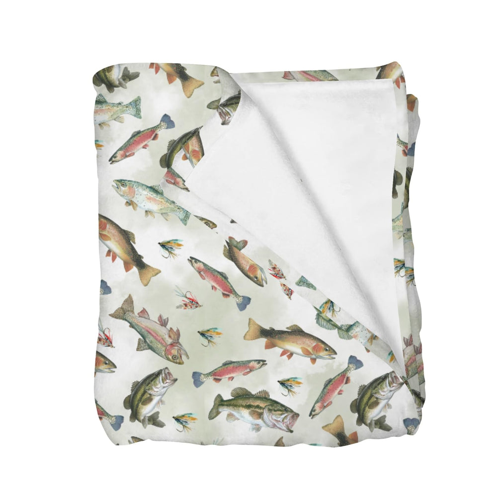 Selgkds neutral fishing baby blanket with fish illustration for a cozy nursery.