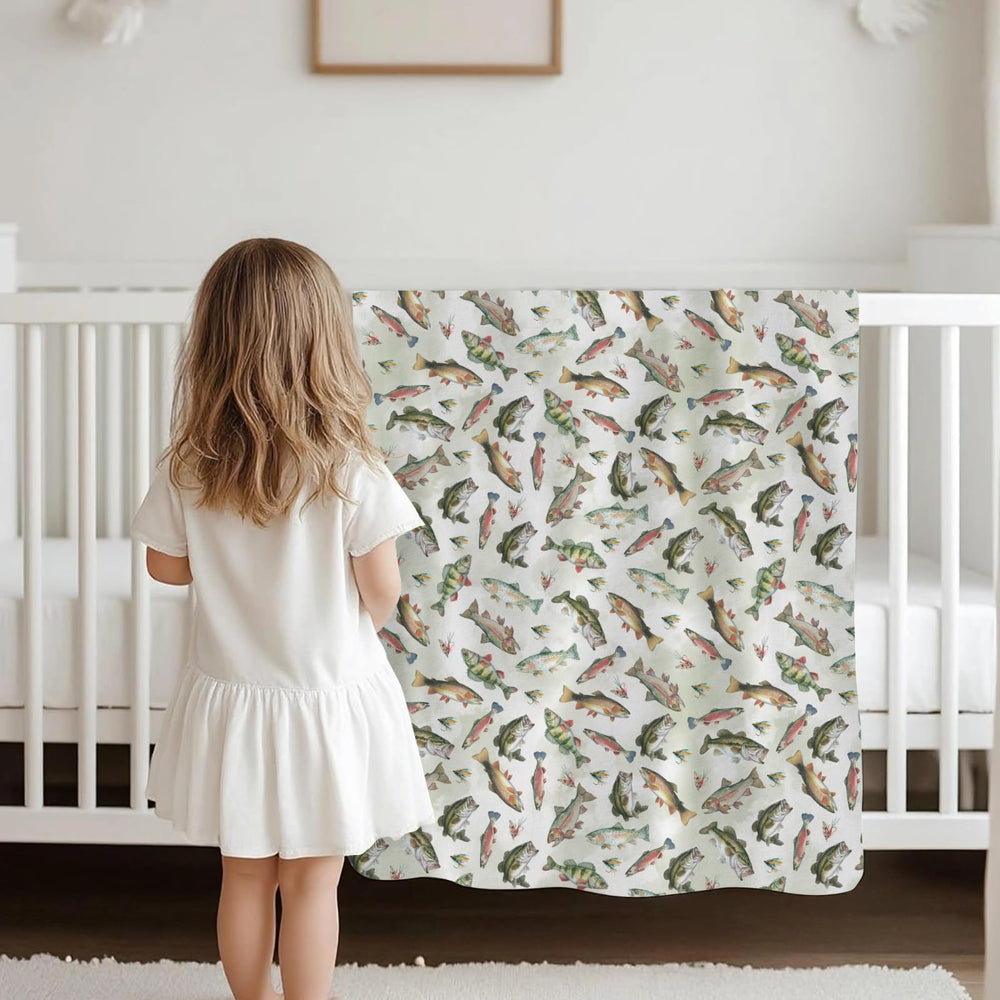 Selgkds versatile blanket serves as swaddle or stroller cover.