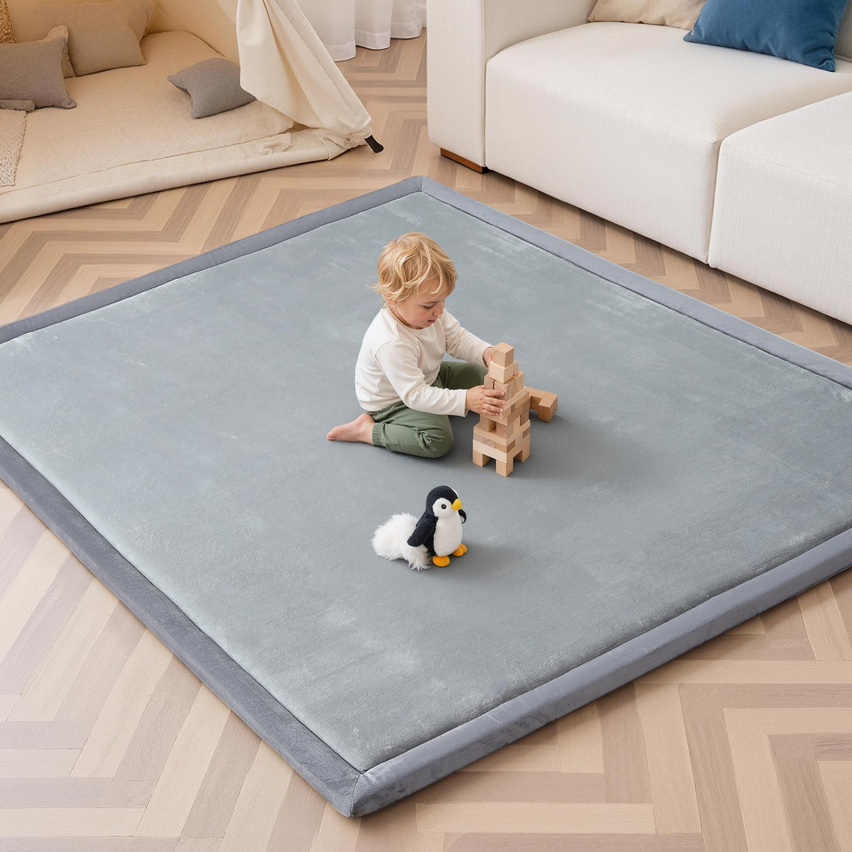 SEPARO baby play mat with plush surface supports comfortable tummy time on hard floors.