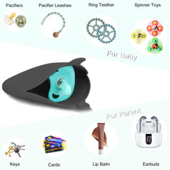 Seposeve pacifier holder case clipped to a diaper bag for quick access.