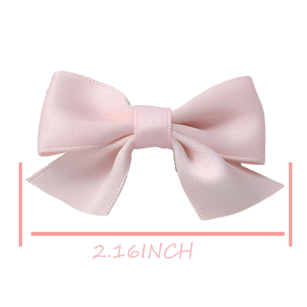 SEVENHEAD black bow clip close up with heat sealed ribbon ends to prevent fraying
