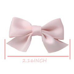 SEVENHEAD black bow clip close up with heat sealed ribbon ends to prevent fraying