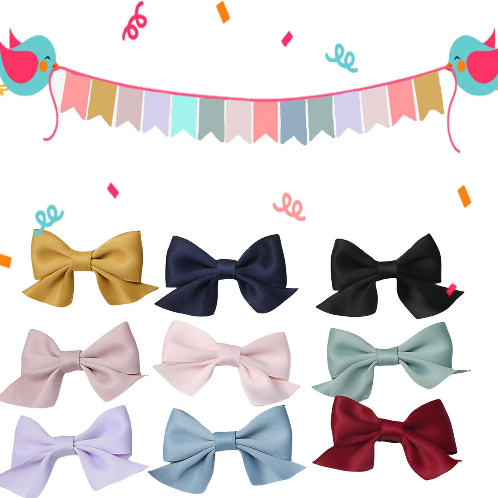 SEVENHEAD black bow hair clip displayed in retail packaging for easy gift-giving