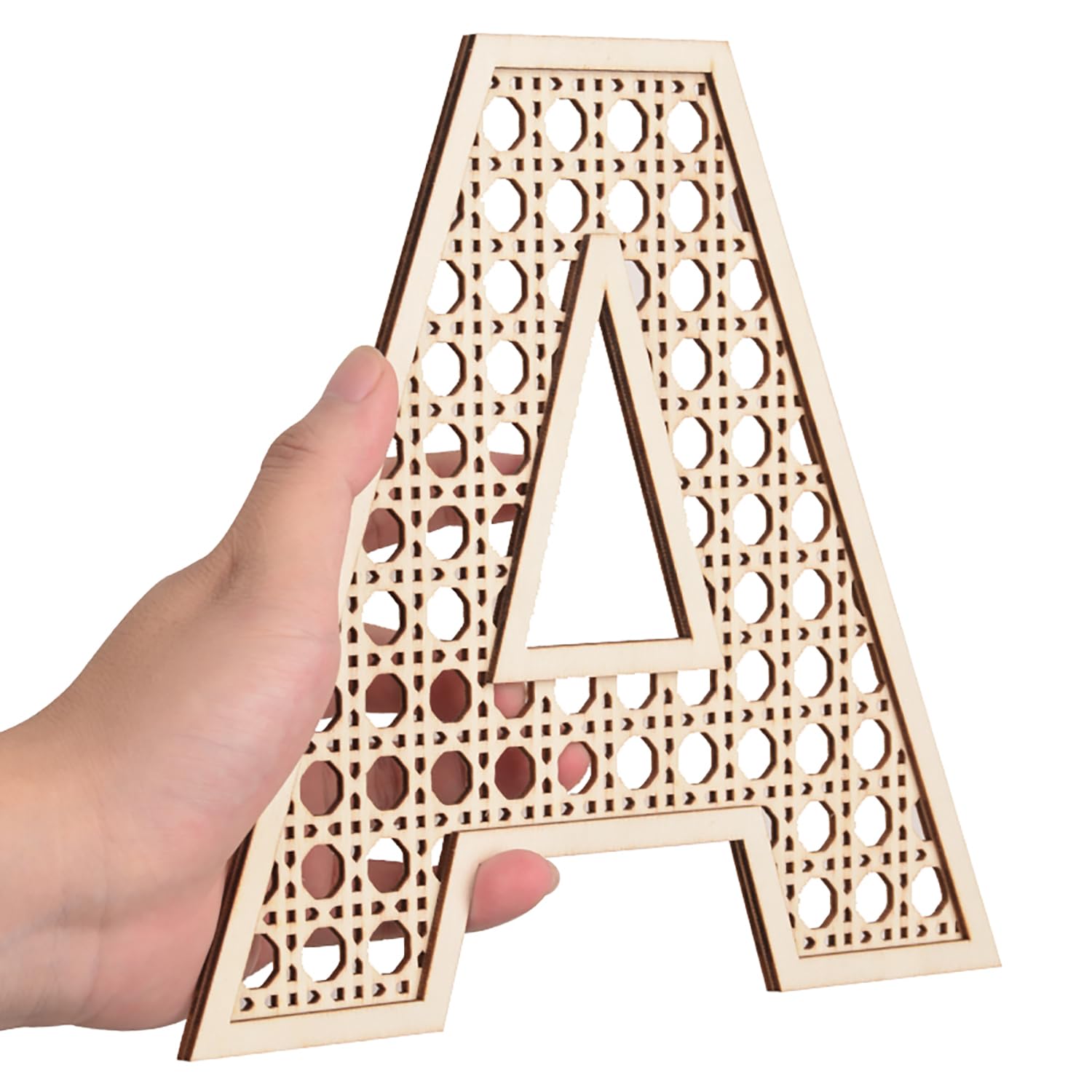 Large rustic X letter enhances wall art with warm appeal