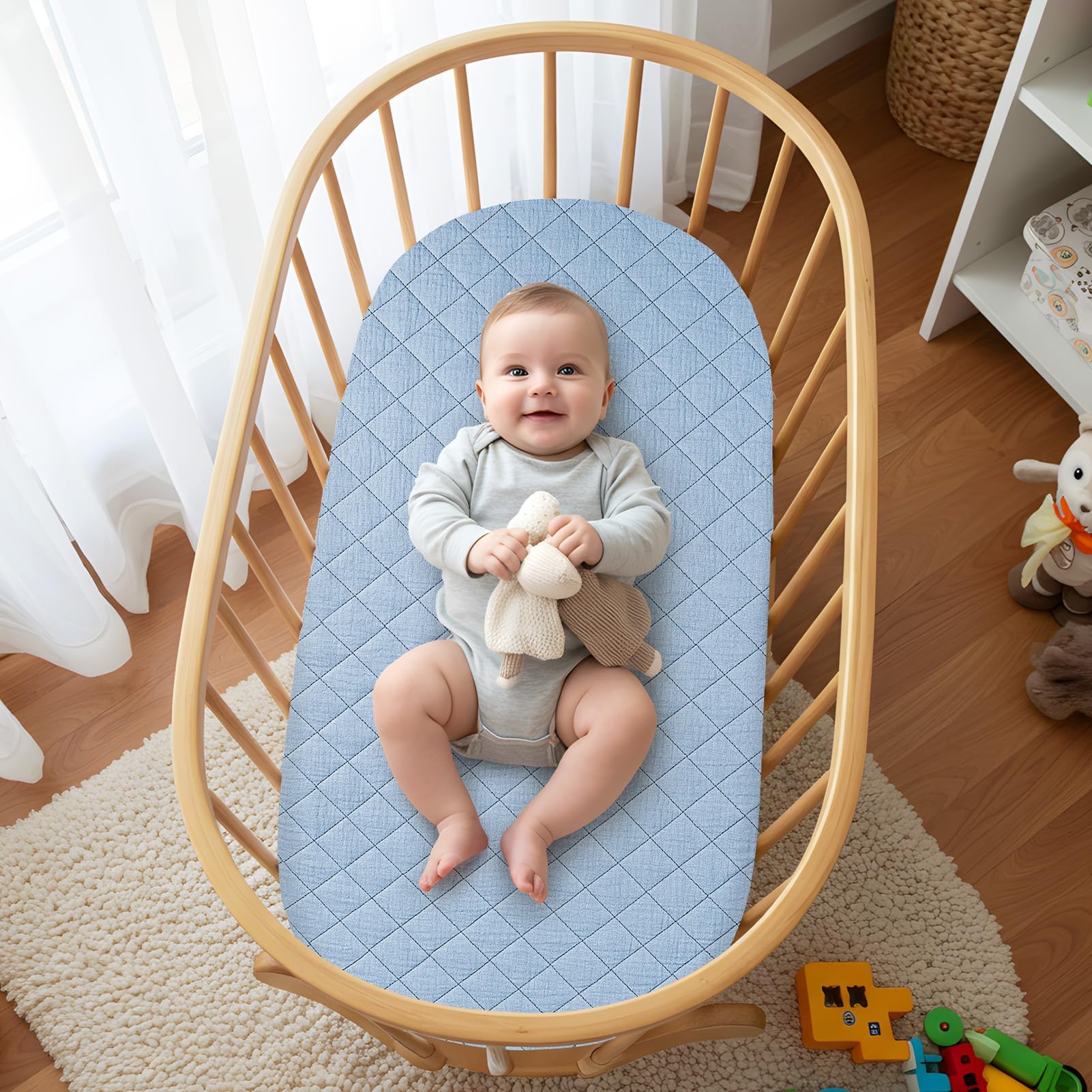 SheSeek bassinet waterproof layer visible, protecting mattress from leaks.
