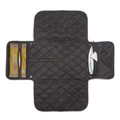 shorty-love quilted changing pad folded for compact travel.