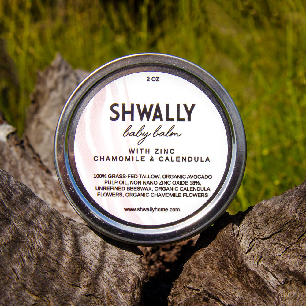 Shwally Avocado oil bottle showcases nourishing oil base for skin.