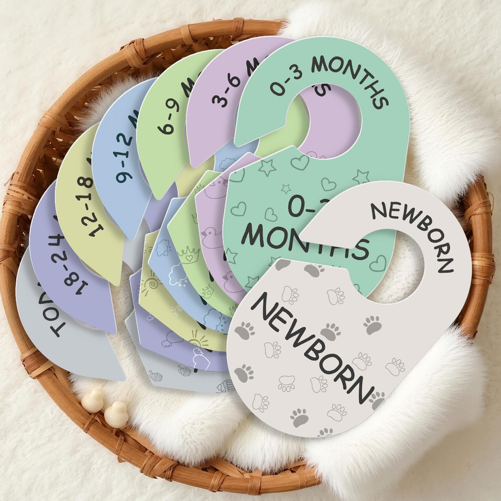 Sicamin baby closet dividers with month labels for easy outfit planning.
