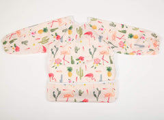 Sigzagor baby bib sleeved shirt pocket back view shows hidden catch-all pocket.