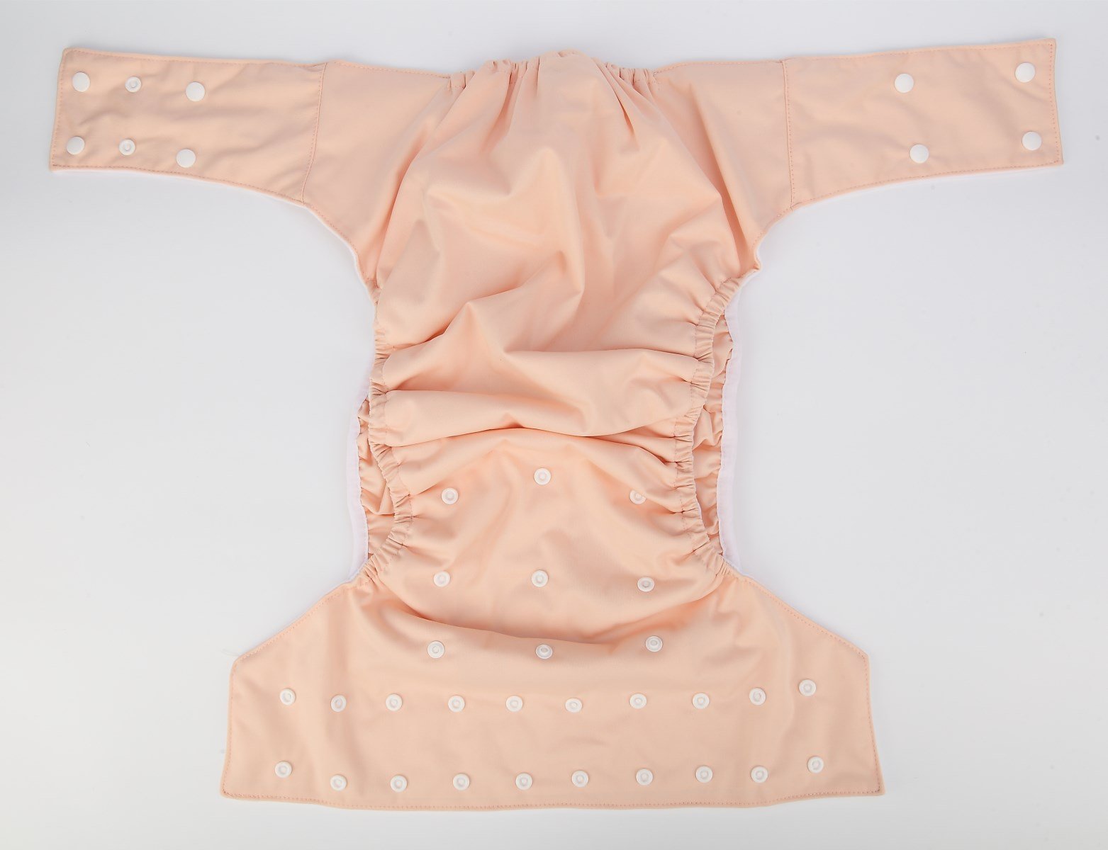 Sigzagor diaper lining uses PUL and microfleece for soft skin contact.