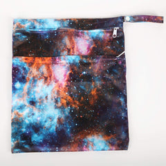 Sigzagor waterproof PUL diaper bag in outer-space design, reusable and easy to wash.