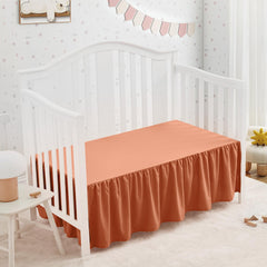 SiinvdaBZX rust orange crib skirt features delicate ruffle for a cozy nursery look.