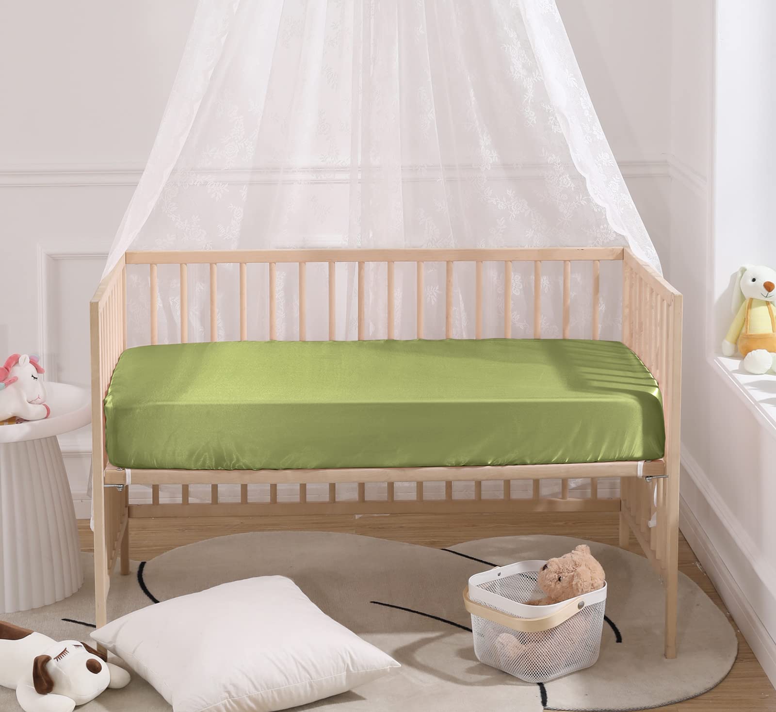 SiinvdaBZX satin crib sheet on a standard crib demonstrates universal fit.