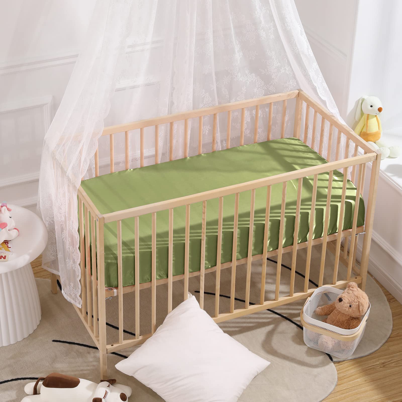 SiinvdaBZX satin crib sheet closeup reveals silky texture reducing friction.