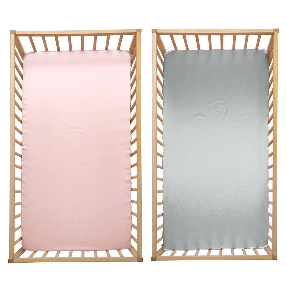 Satin crib sheets with elastic bottom providing snug universal fit
