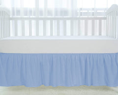 Silentnight light blue crib skirt shows elegant ruffles around the crib posts.