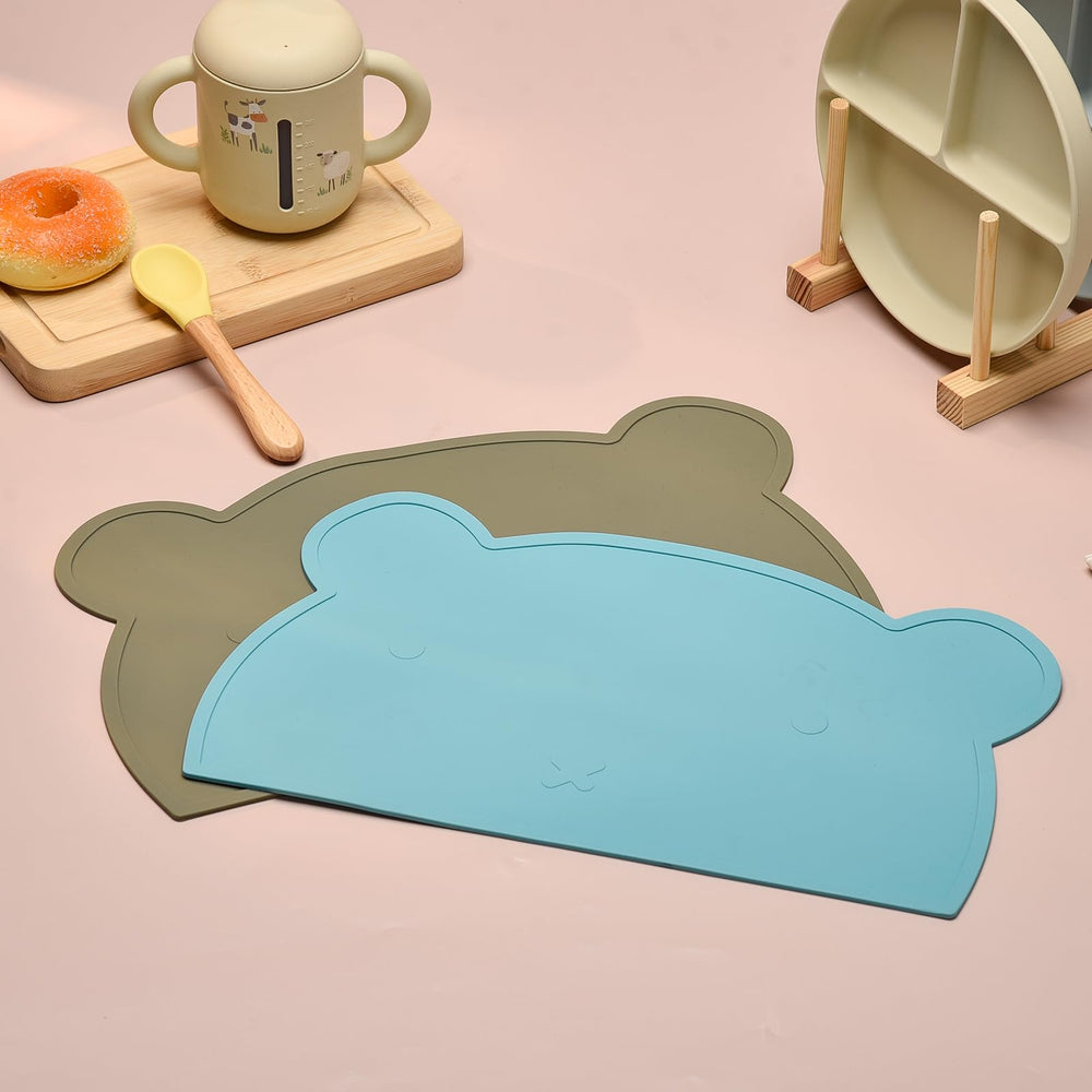 SILI FACTORY two bear placemats beside pastries, show pastry-mat versatility.