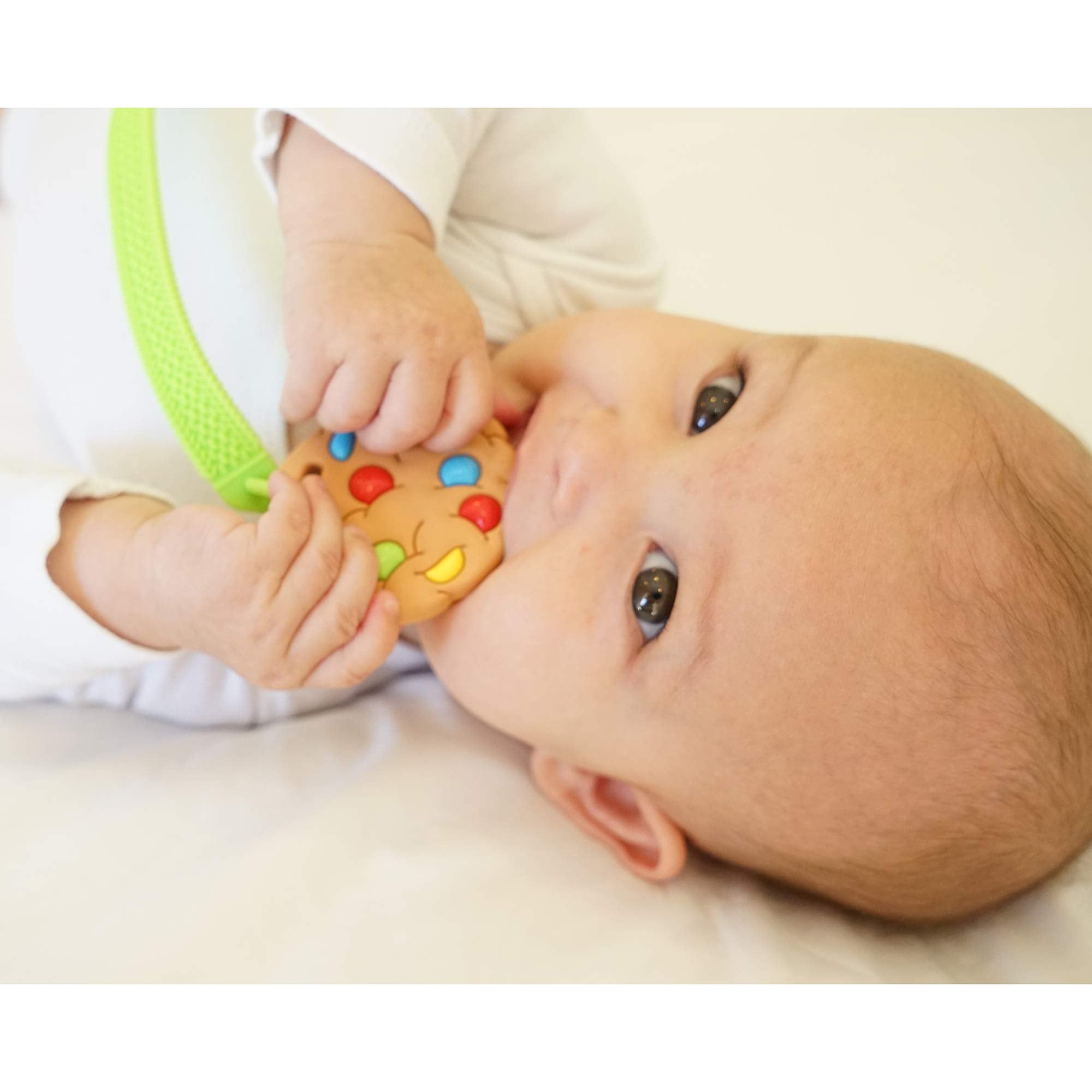 Silli Chews baby teether designed for small hands to grip easily.