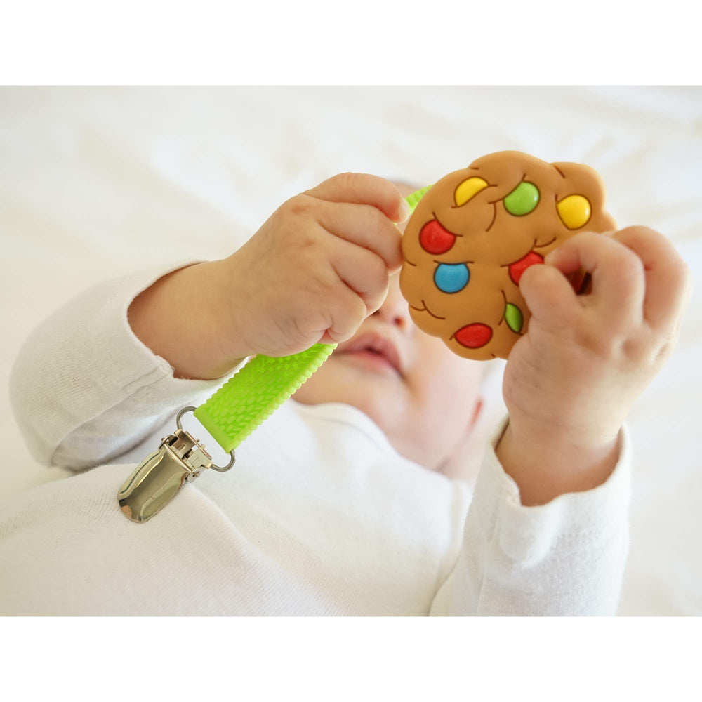 Silli Chews on-the-go teether clip holder for travel convenience.