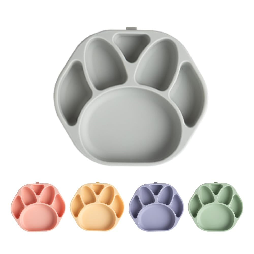 SILUNITY baby plates with suction grip on table for spill-free meals.