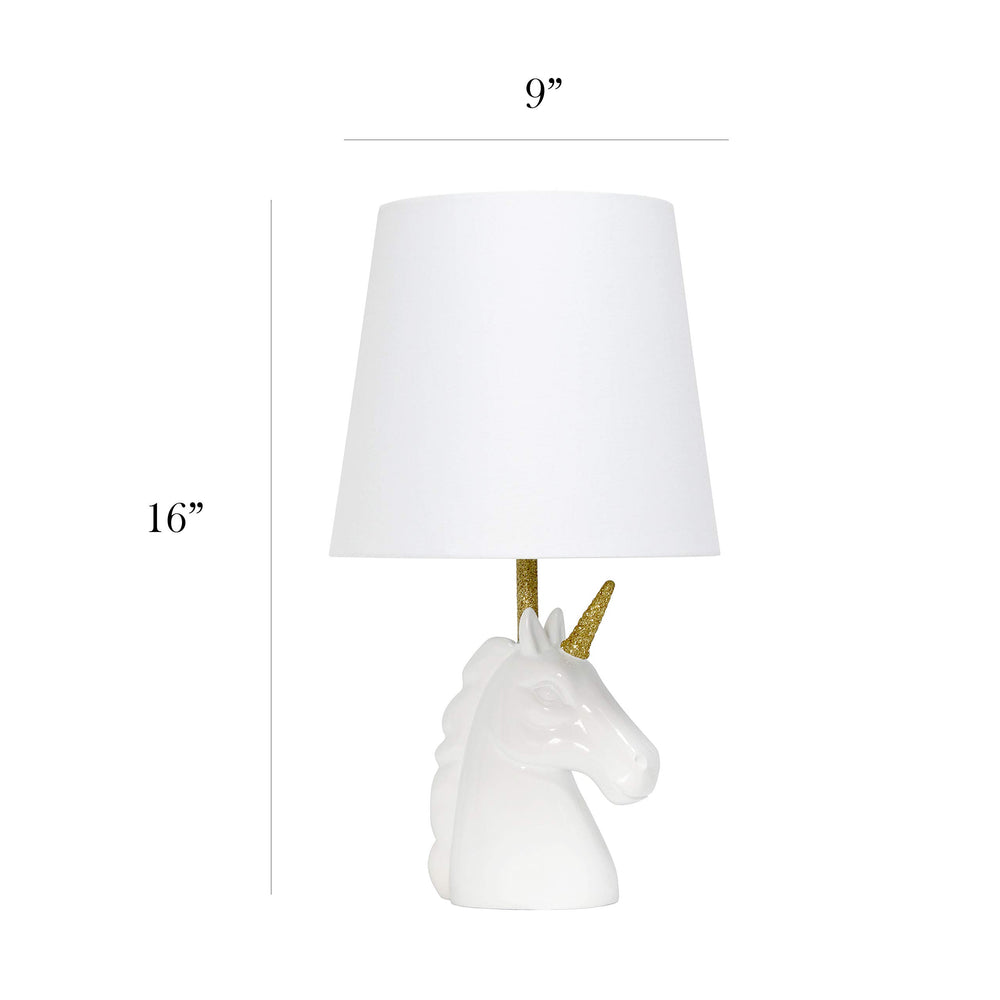 Gold glitter horn detail catches light, creating a magical focal point