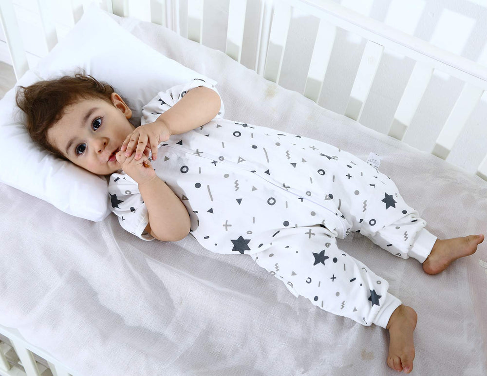 Sincere hip-friendly sleep sack supports safe movement during play and sleep.