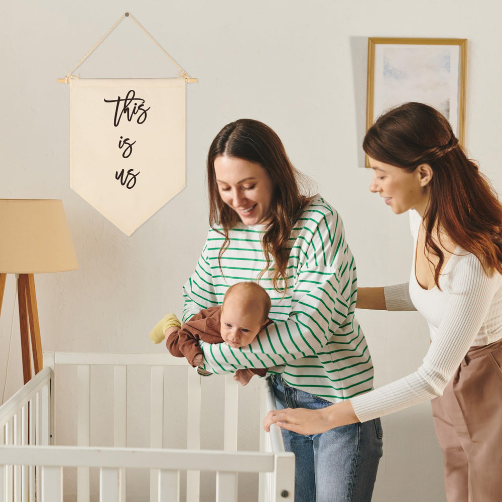 Sioial banner hanging on wall showcases cotton canvas texture for warm home accents.