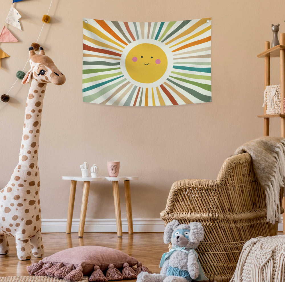 Sioial sun-themed banner enhances crib and playroom decor