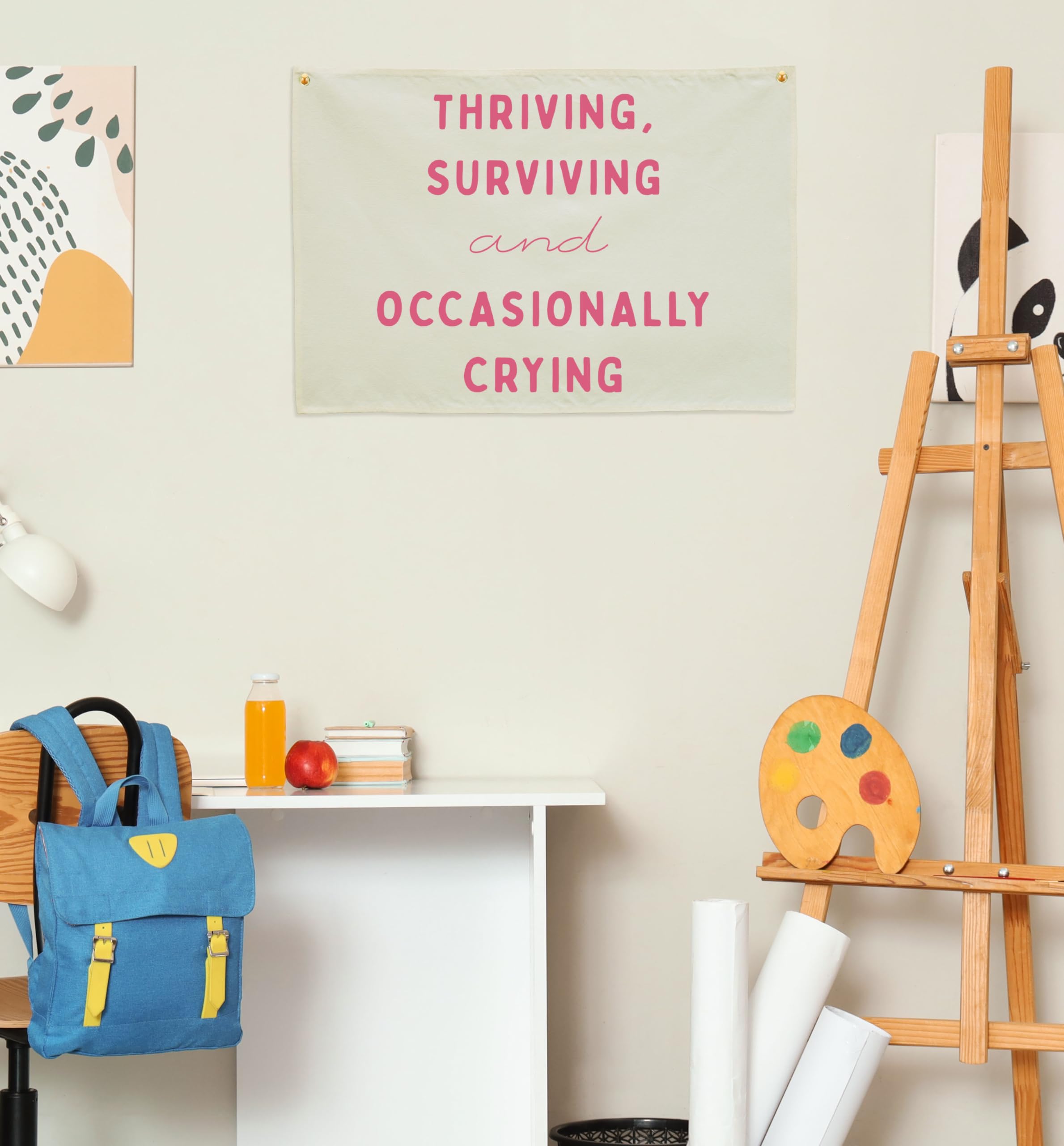 Sioial nursery decor banner creates a calm, inviting learning space.
