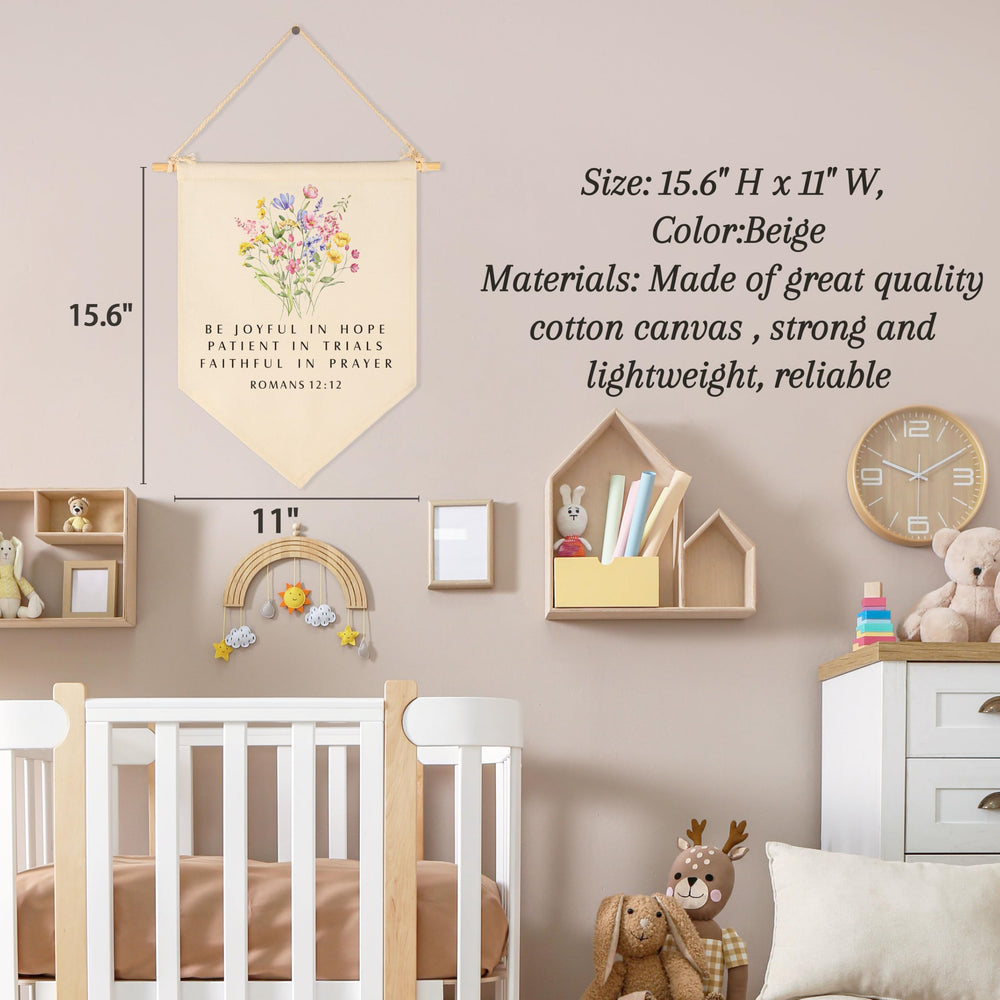 Sioial beige nursery banner complements wall color.