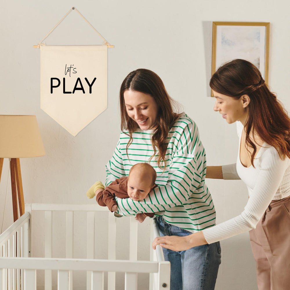 Sioial Playroom canvas banner decorates walls with durable fabric for kids' rooms.