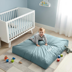 Skil-Care 36x48 cushion protects bed edges during naps and diaper changes.