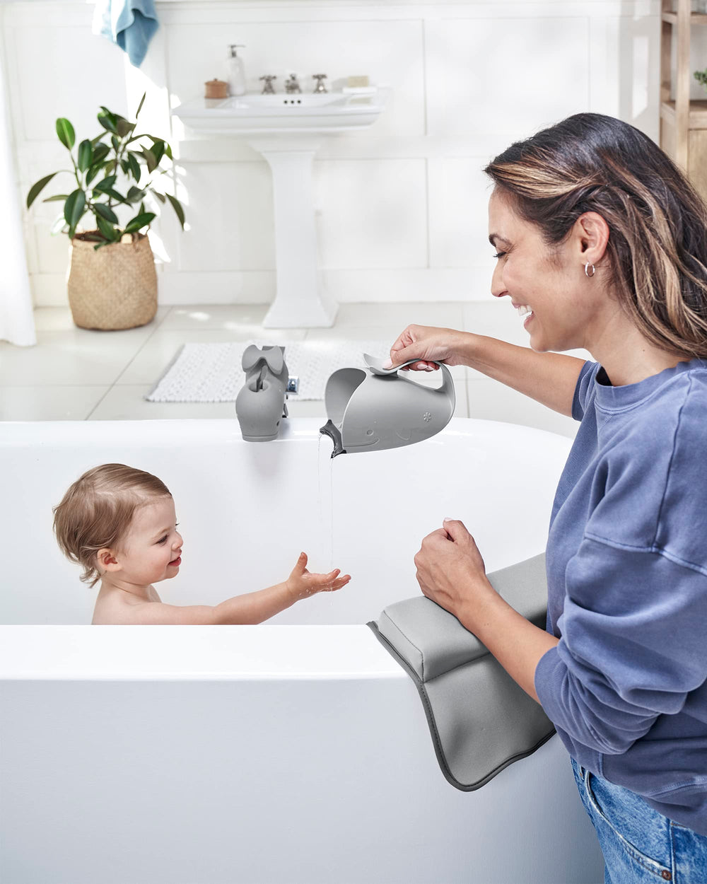 Skip Hop MOBY bath time setup with the rinse cup