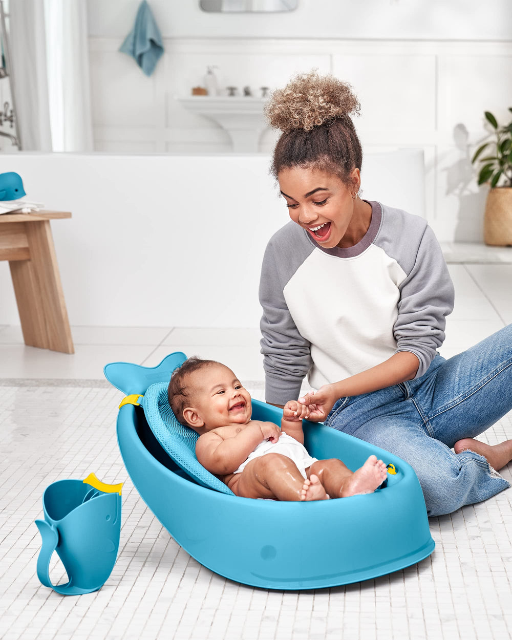 Skip Hop MOBY bath collection coordinated in blue for cohesive tub time