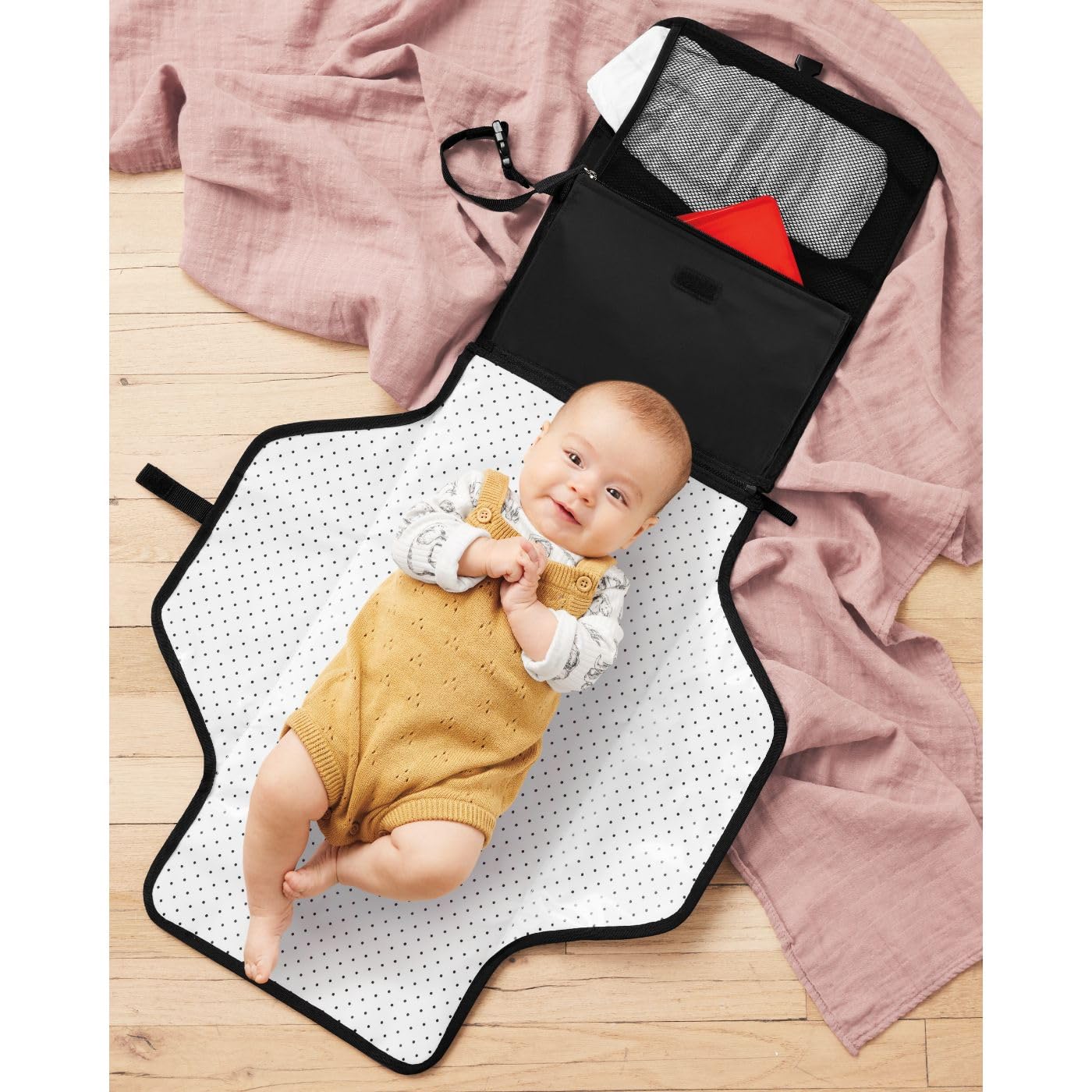Skip Hop Pronto clutch remains compact while carrying baby gear
