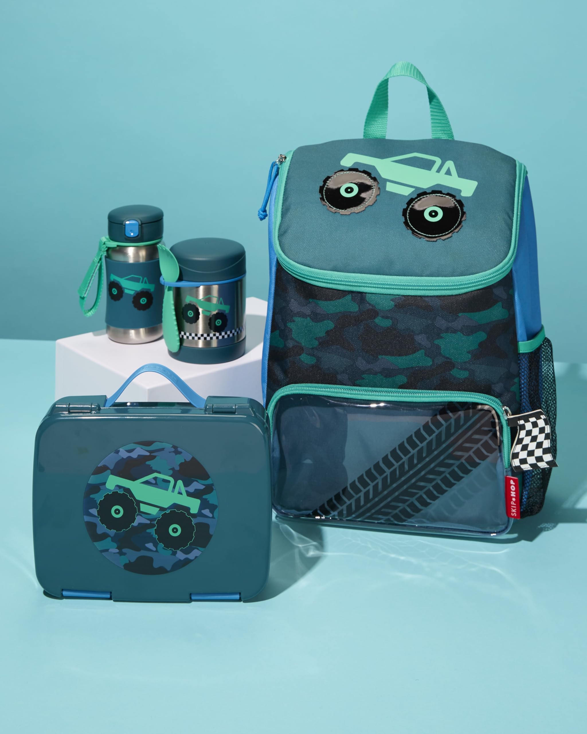 Skip Hop Sparks bottle includes a grab strap for attaching to bags and strollers