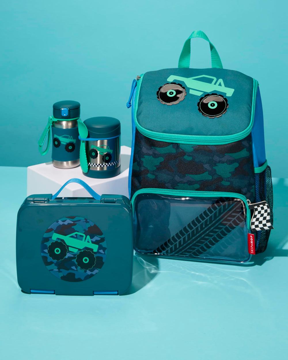 Skip Hop Sparks bottle includes a grab strap for attaching to bags and strollers