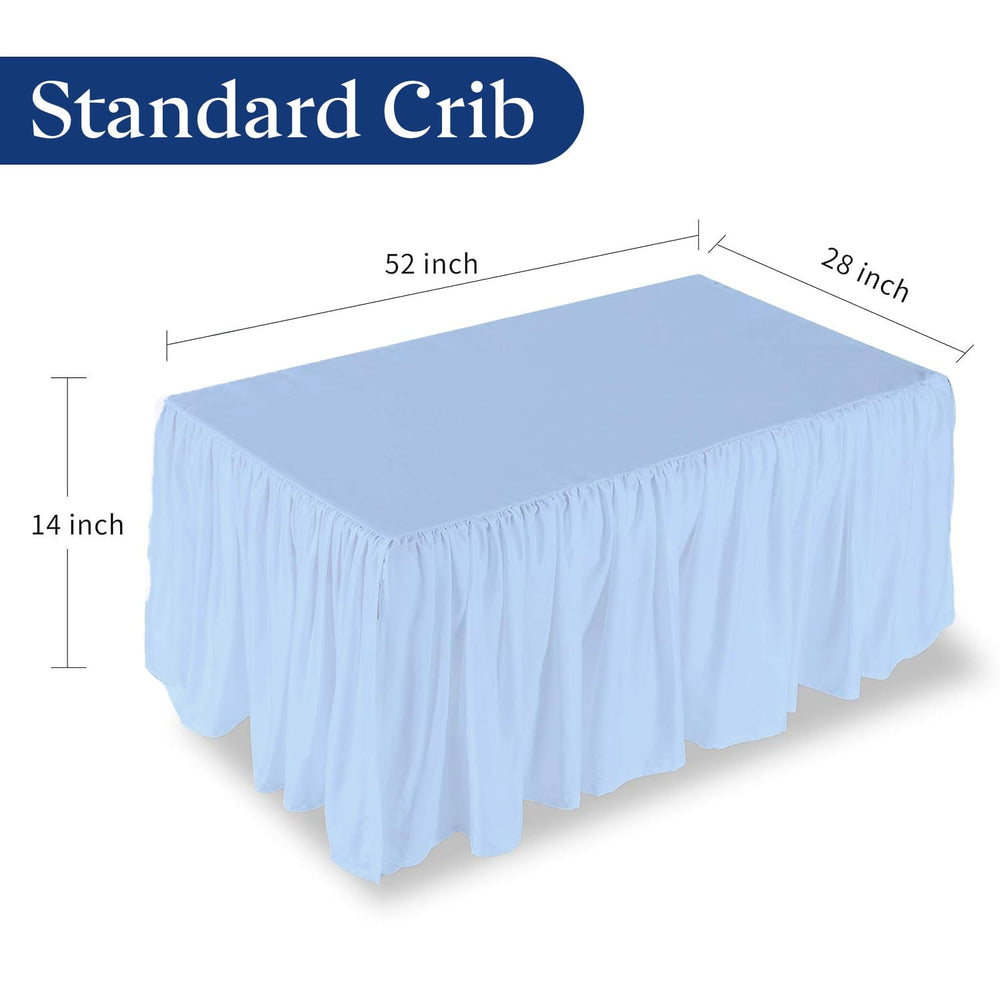 Sky Beddings crib skirt side view showing four-split corners for easy, secure fitting.