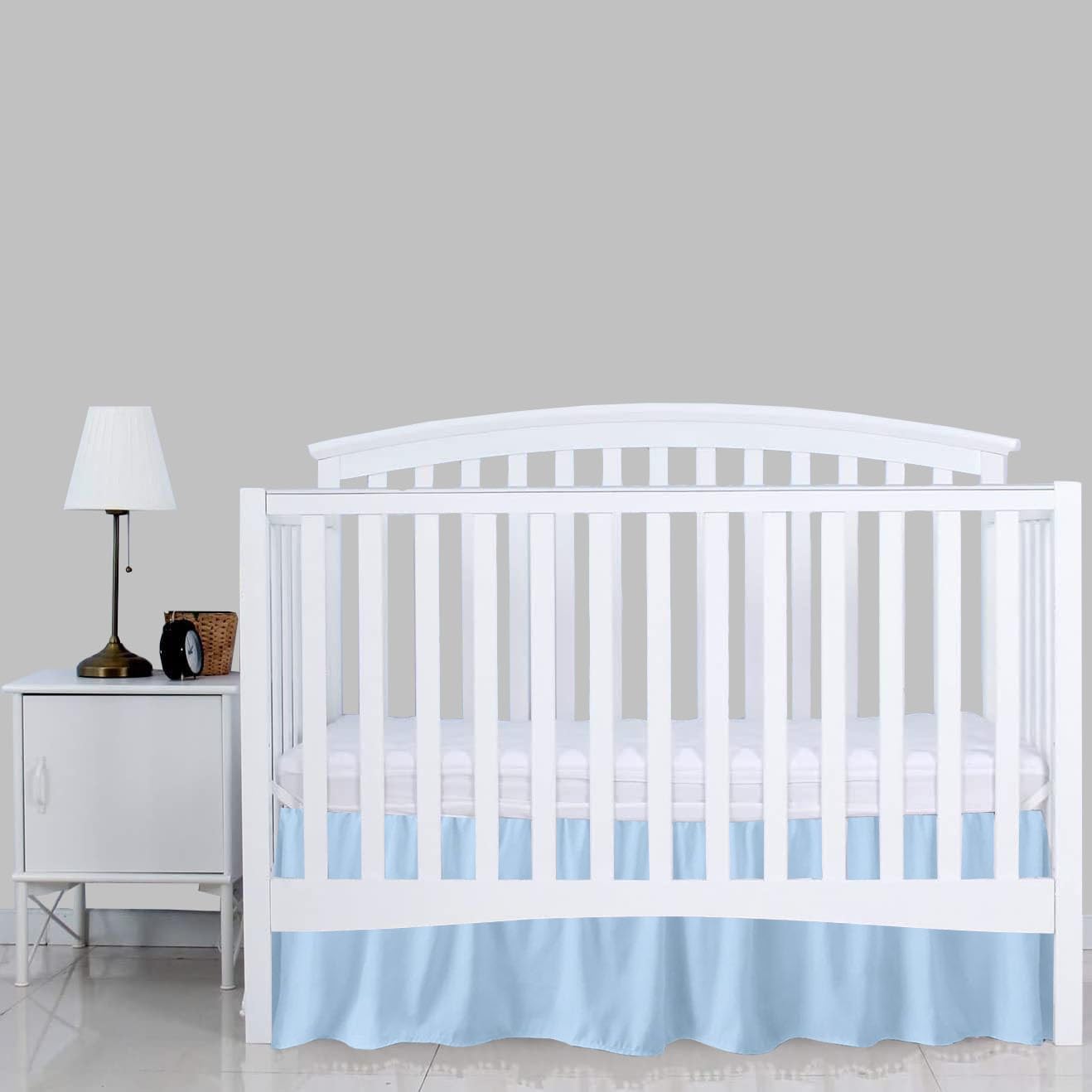 Sky Beddings dust ruffle crib skirt on woven platform demonstrating durability.