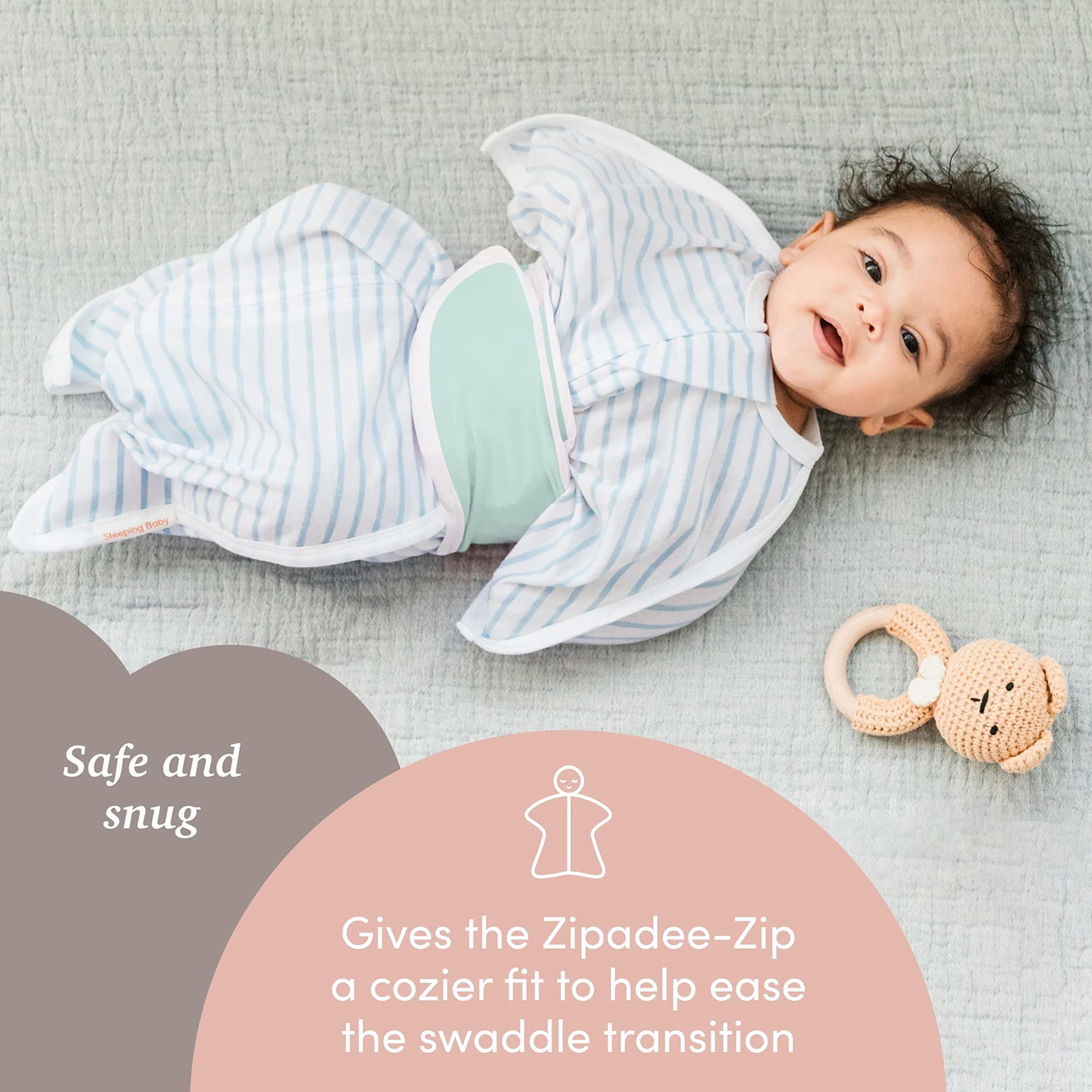 SleepingBaby Snuggle Strap emphasizing arm mobility while swaddled.