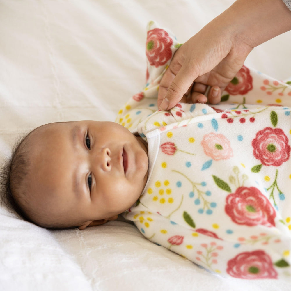 SleepingBaby zip design supports diaper changes without fully undressing.