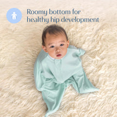 SleepingBaby Zipadee-Zip mint swaddle in use for safe overnight wear.