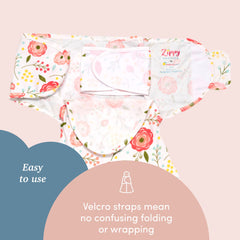 Baby wearing SleepingBaby Zippy Swaddle Pink Poppy demonstrating leg movement room