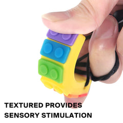 SLGOL rainbow silicone chew pendant close-up shows textured sensory surface