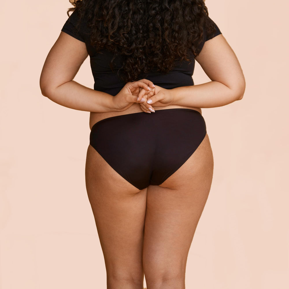 Slick Chicks Signature Brief Panty black color close-up reveals soft stretch fabric.